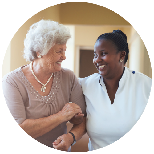 Elderly woman laughing with companion